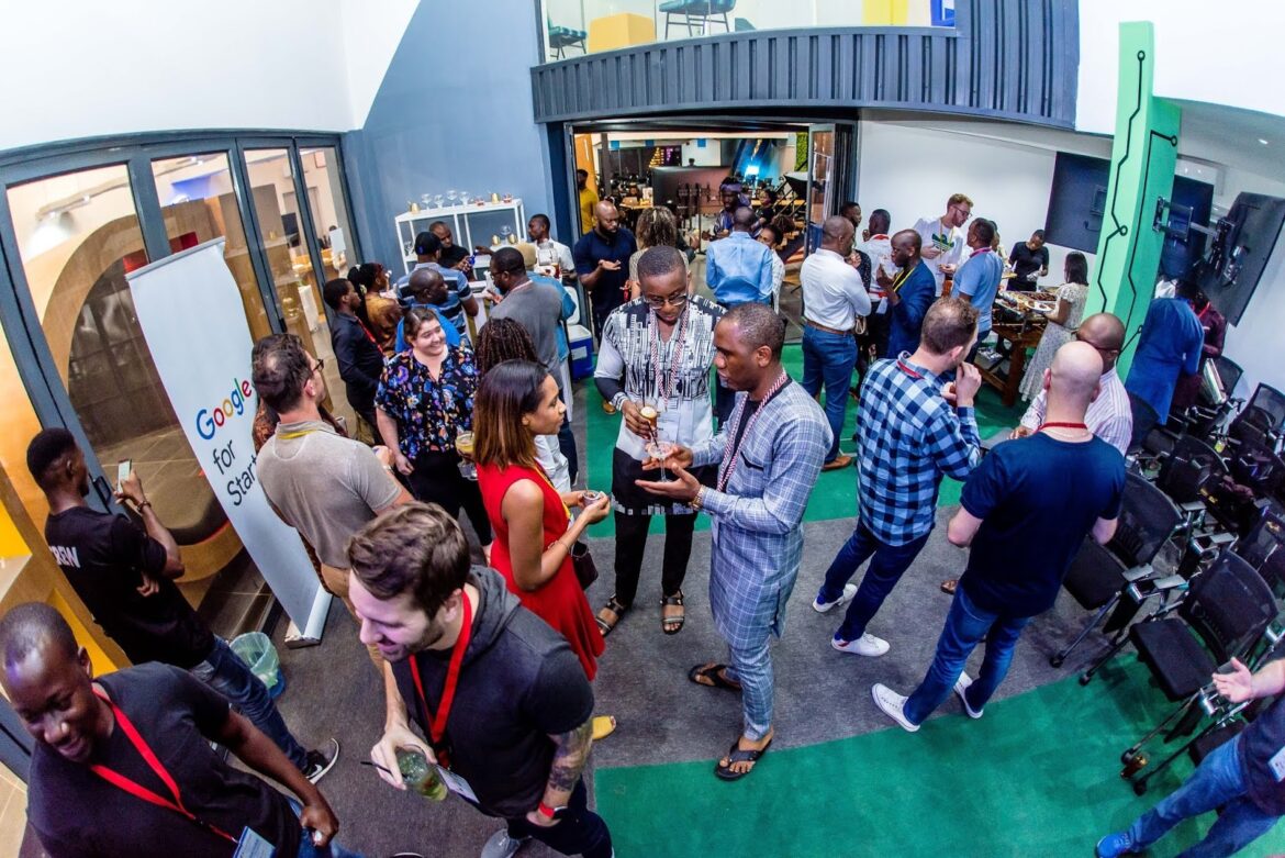 Developers and startup founders networking inside Google Developers Space in Lagos, Nigeria, during a tech community event supported by Google.